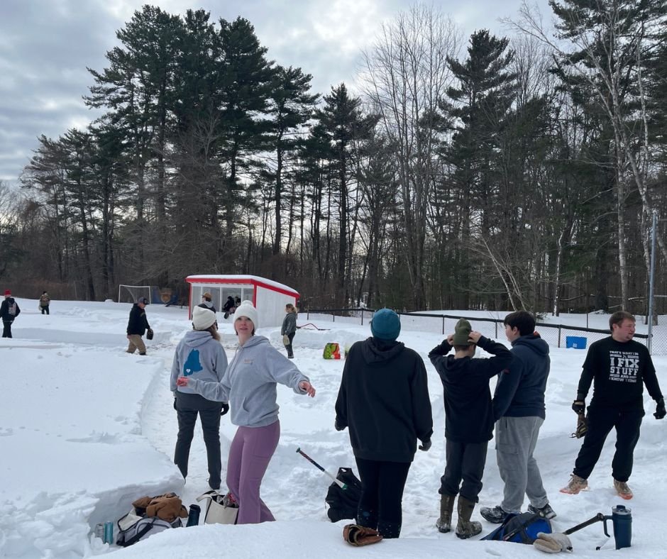 Hardy Mainers brace the cold playing softball in the snow